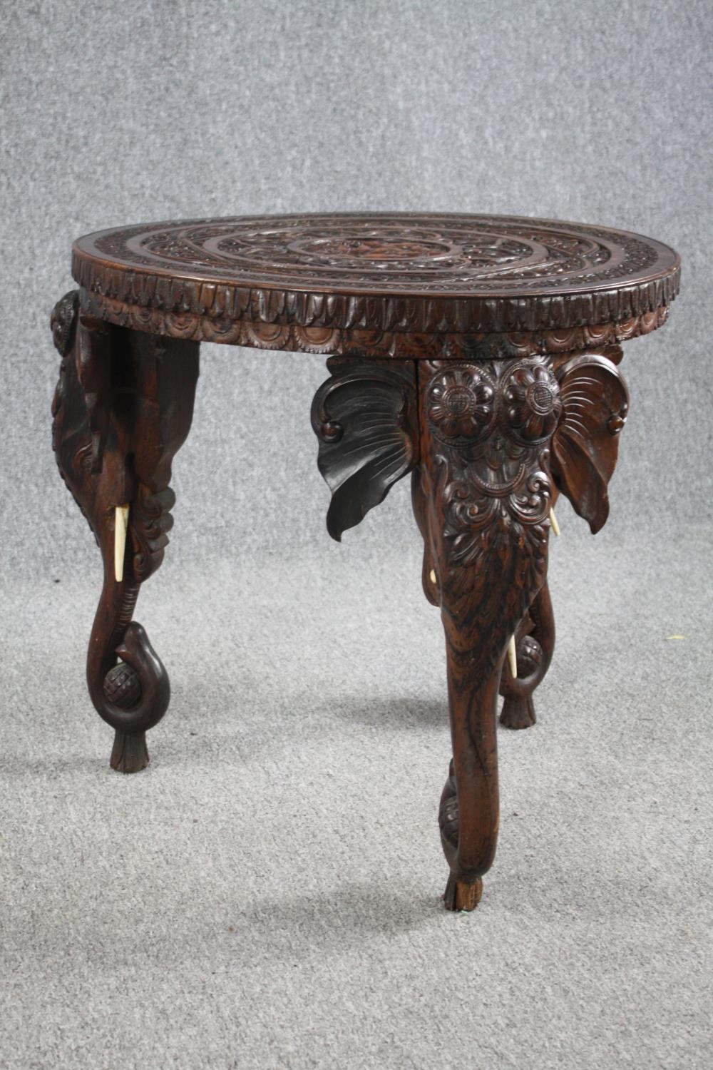 Lamp or occasional table, eastern carved hardwood with elephant supports and bone tusks. H.62 Dia. - Image 3 of 5