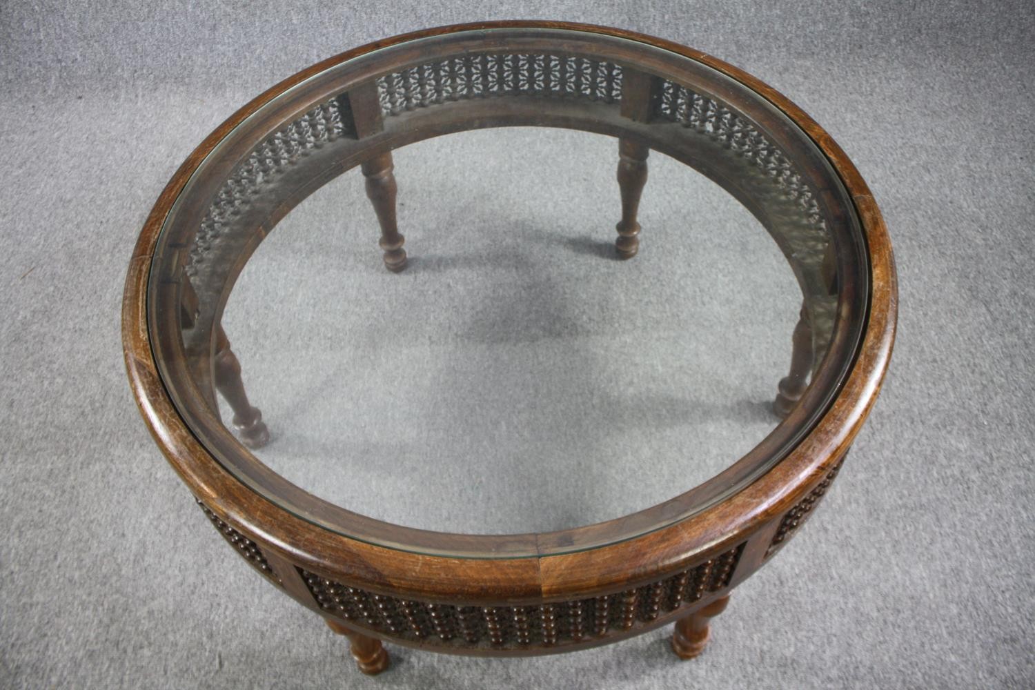 Coffee table, North African style hardwood with plate glass inset top. H.50 Dia.98cm. - Image 4 of 5