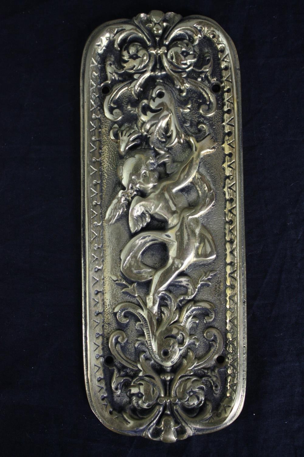 Four brass door plates with repousse cherub design. H.20 W.8cm. (each) - Image 2 of 4