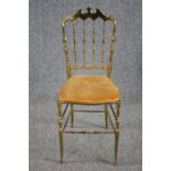 A vintage brass framed salon chair. H.91cm.