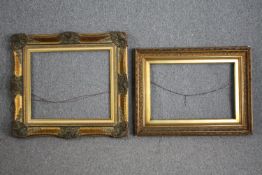 Two decorative wooden frames painted gold. H.75 W.83cm. (largest)