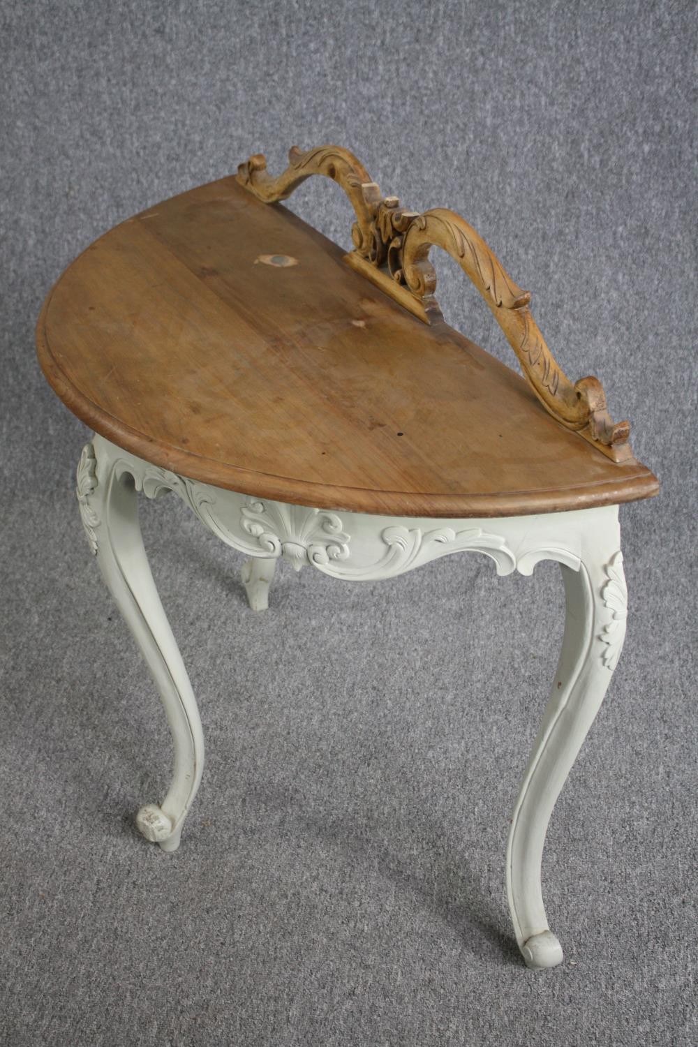 A carved and painted console table on slender cabriole supports. H.88 W.90 D.42cm. - Image 3 of 4