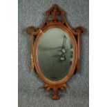 Wall mirror, 19th century style carved hardwood with swags and husks and fitted with a bevelled