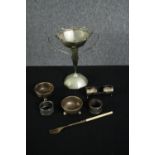 A mixed collection of silver plate including a pair of napkin rings, a fork, an Art Nouveau twin