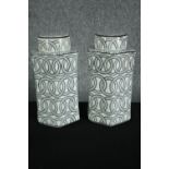 A pair of black and white lidded ginger jars decorated with chainlink pattern. H.31cm. (each)