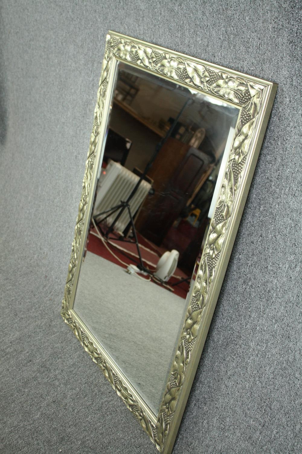 Wall mirror, contemporary silvered foliate frame with bevelled plate. H.107 W.76cm. - Image 3 of 5