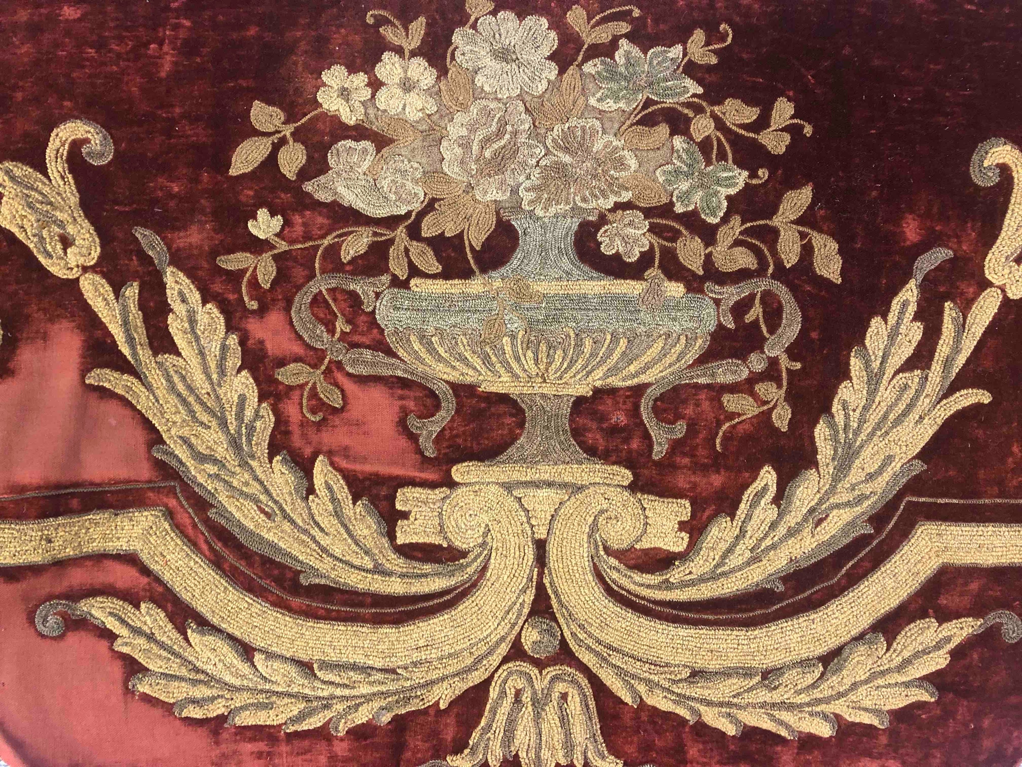 A 19th century red silk velvet pelmet with classical flower urn design, embroidered with gold and - Image 2 of 6