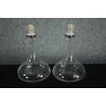 A pair of modern glass decanters with decorative diamante stoppers. H.33cm. (each)