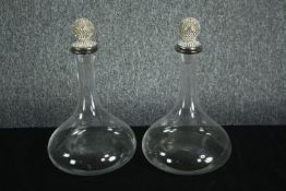 A pair of modern glass decanters with decorative diamante stoppers. H.33cm. (each)