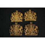 Four coats of arms. Wall plaques. Moulded and finished in gold. H.17 W.17cm. (each)