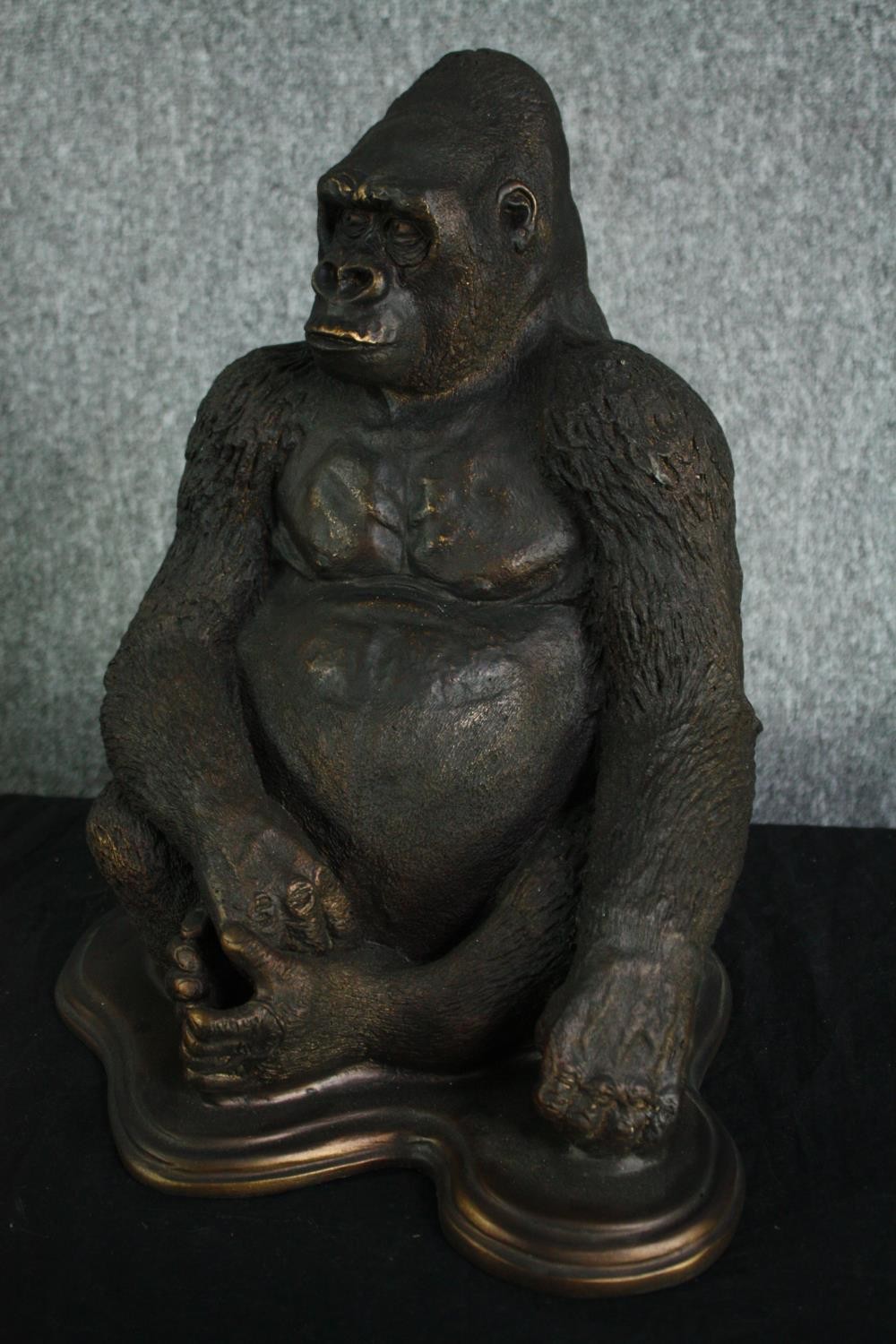 A large moulded figure. A gorilla finished in a distressed bronze type patina. H.40cm. - Image 4 of 4