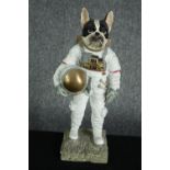 'Cosmic canine explorer'. A dog figure dressed as an astronaut. H.39cm.