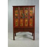 Hall or linen cupboard, C.1900 Chinese lacquered with hand decorated panel doors enclosing a shelved
