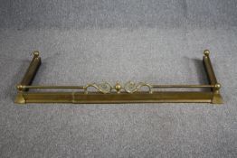 Fire kerb, late 19th century brass. L.130 W.52cm.