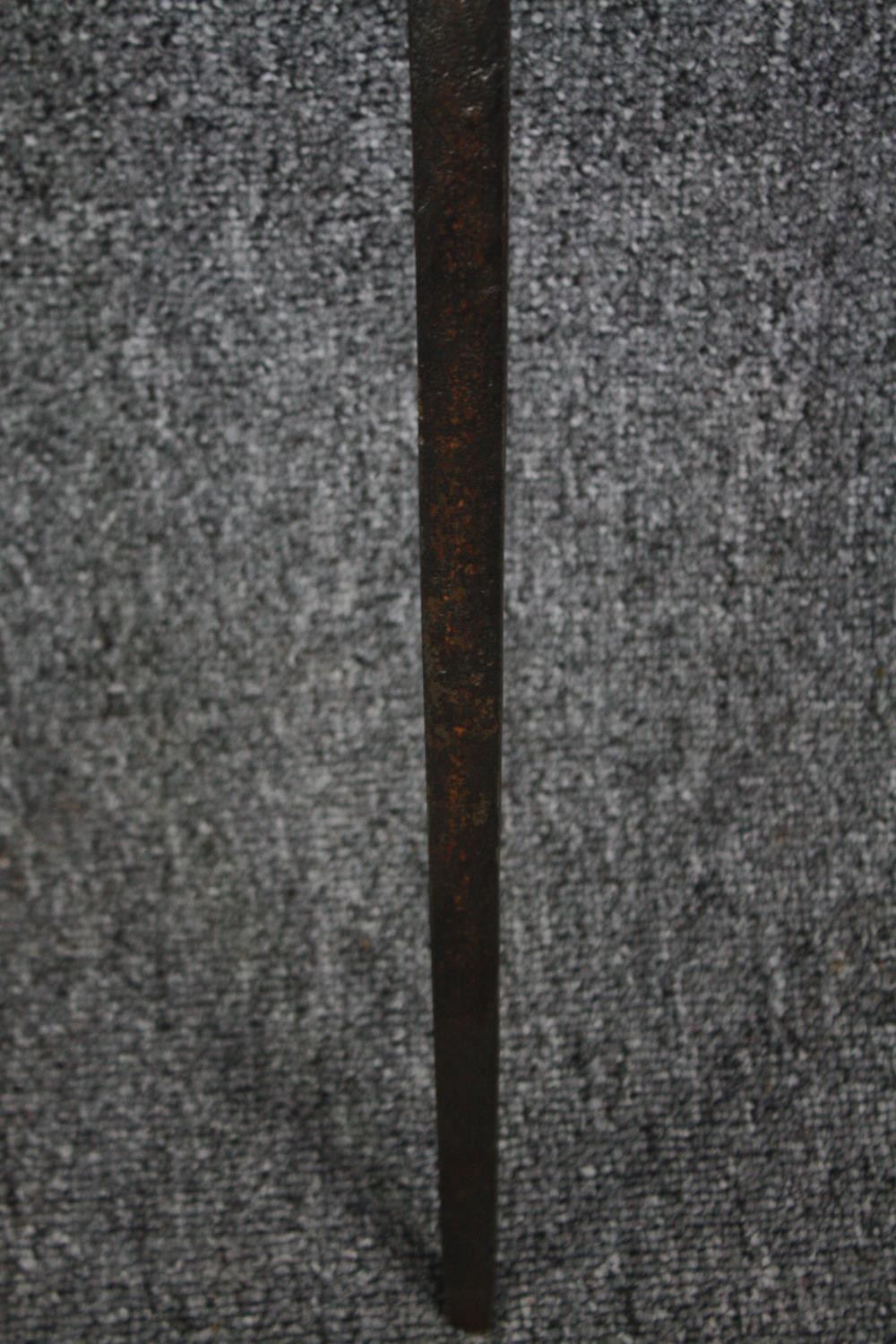 A sword and scabbard. Quite rusted and without a visible maker's mark. With a wooden handle and - Image 5 of 7
