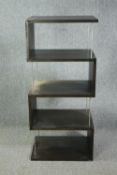 A contemporary teak and chrome display stand. H.133 W.60 D.45cm. (Some veneer lifting but present as