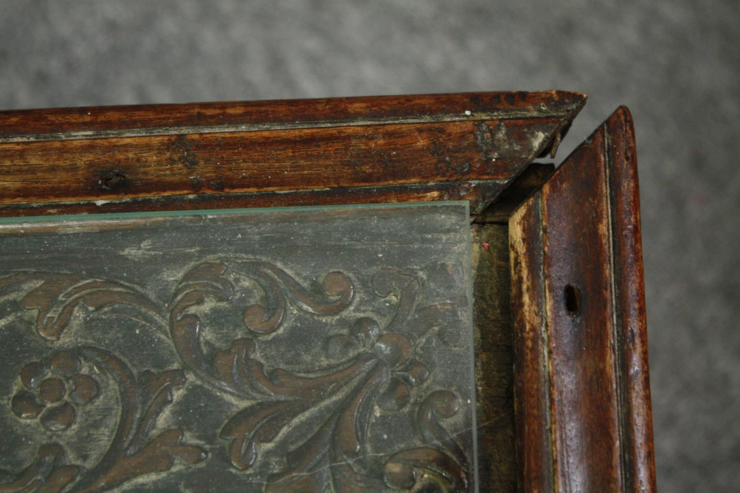 An 18th century oak cupboard base profusely carved allover with scrolling foliate motifs. H.41 W. - Image 10 of 11