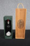 Vintage port. Taylor's Late Bottled Port, 1982 in a presentation box and a boxed bottle of Dow's