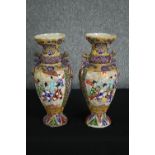 Two Japanese satsuma vases. Glazed ceramics with highly detailed raised figural decoration.