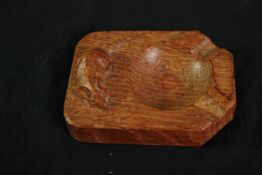 A Robert Thompson of Kilburn "Mouseman" oak ashtray carved with signature mouse. L.10 W.7.5cm.