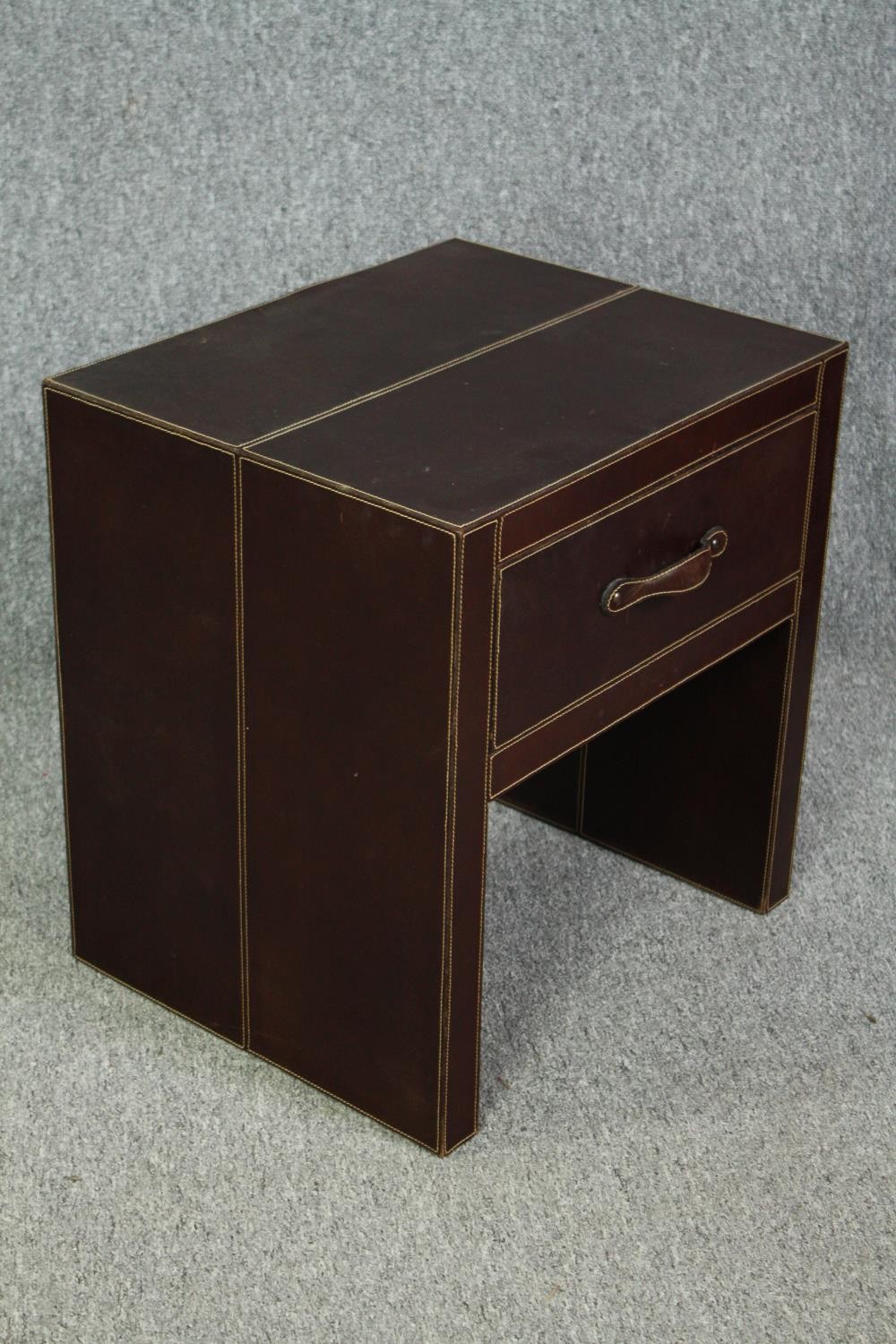 A pair of contemporary bedside cabinets covered in stitched leather. H.53 W.50 D.44cm. - Image 3 of 5