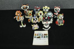 Twelve Lorna Bailey ceramic cats. Each hand painted and signed on the base. With a Lorna Bailey