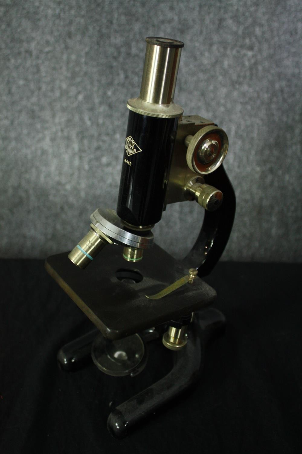 A WR Prior Microscope in a wooden travel case. Brass and black lacquered metal on a Y-shaped foot. - Image 7 of 8