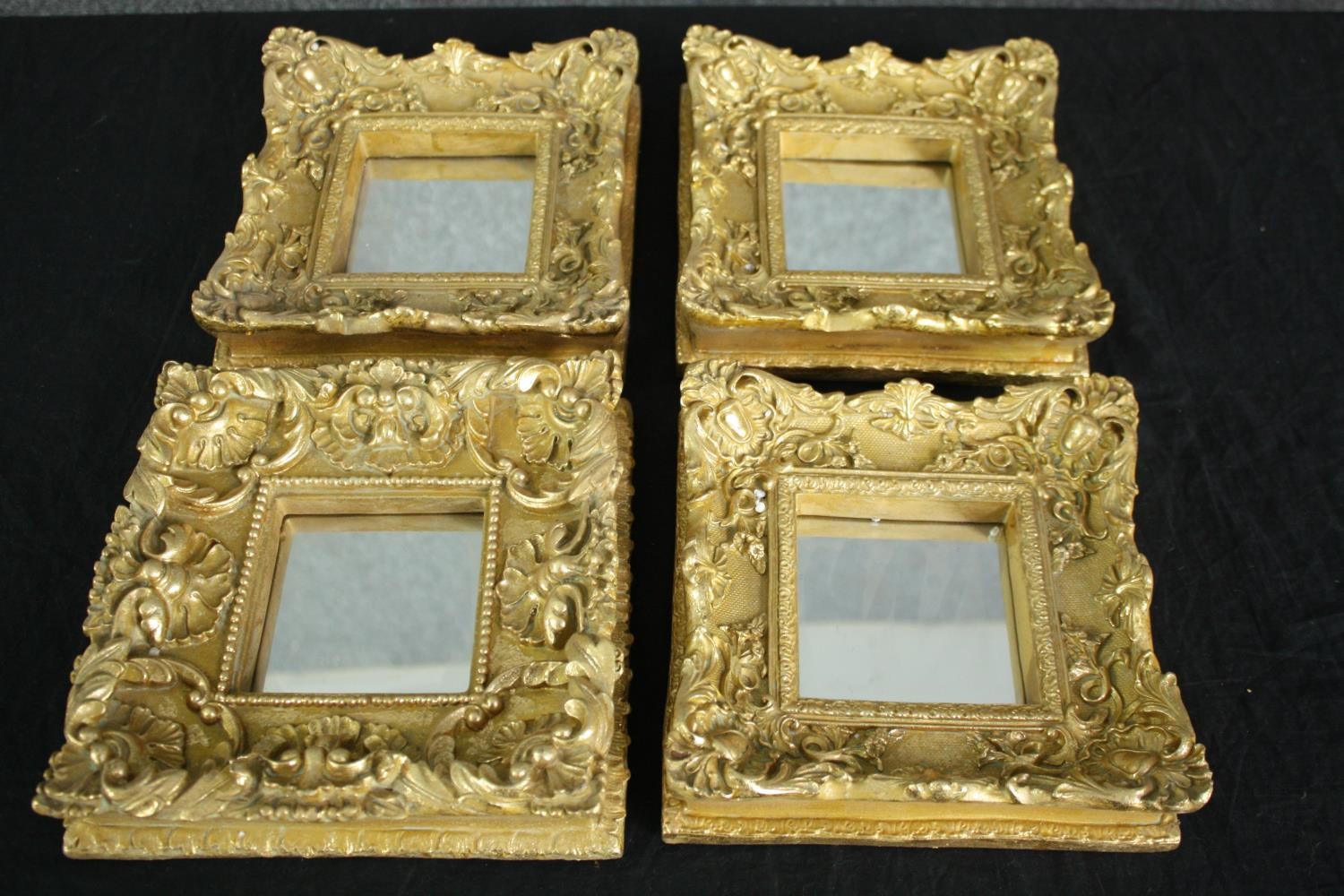 A set of four small contemporary antique style mirrors. H.22 W.22cm. (each)