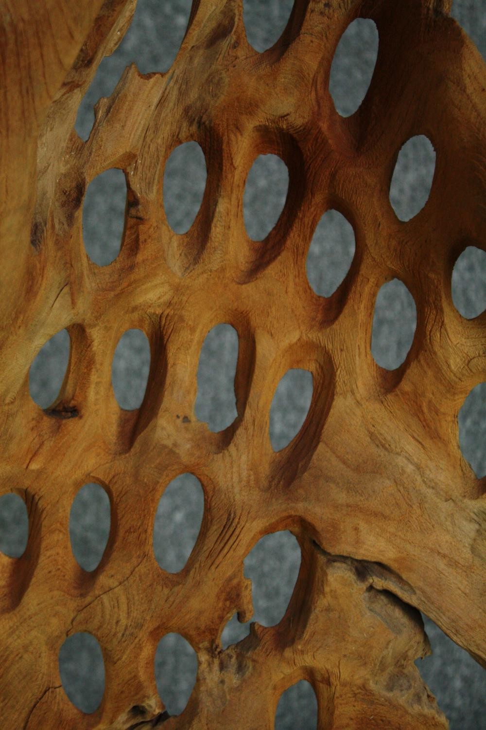 A driftwood abstract sculpture. Honeycombed on a hardwood stand. H.80cm. - Image 4 of 4