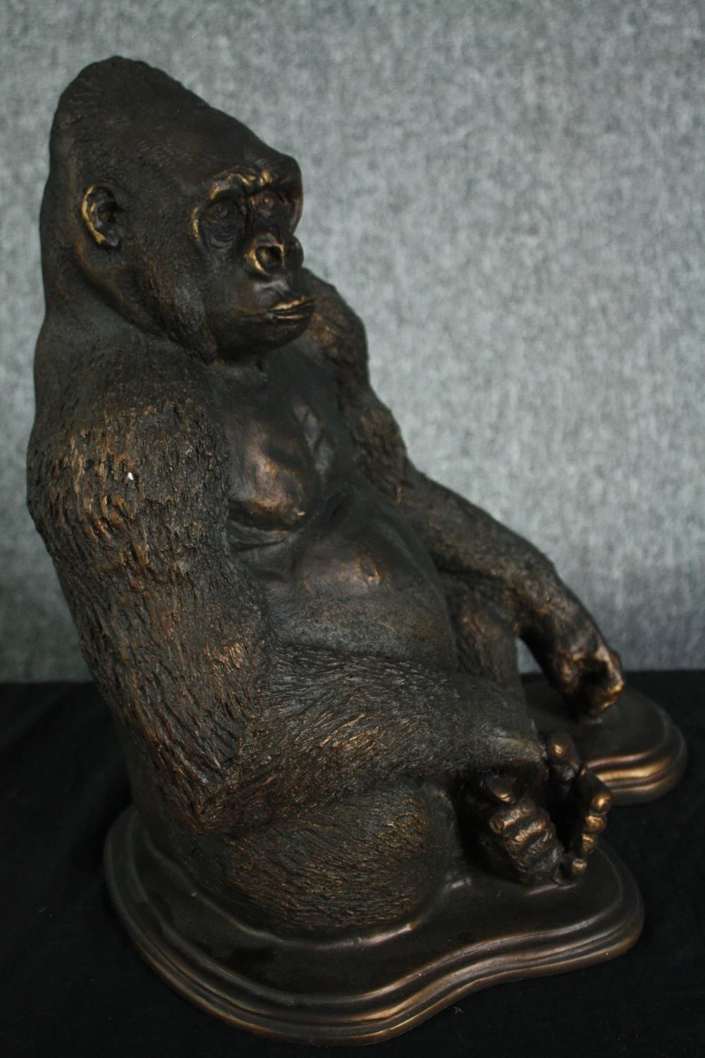 A large moulded figure. A gorilla finished in a distressed bronze type patina. H.40cm. - Image 3 of 4