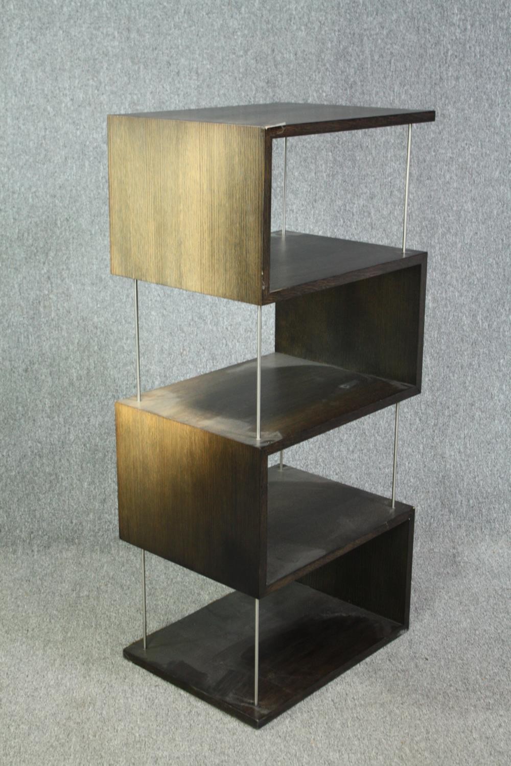 A contemporary teak and chrome display stand. H.133 W.60 D.45cm. (Some veneer lifting but present as - Image 2 of 6