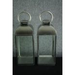 Two steel storm lanterns for candles. H.60cm. (each)