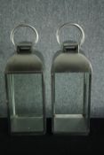 Two steel storm lanterns for candles. H.60cm. (each)