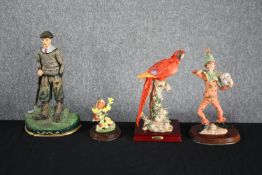 A mixed collection of figurines. Three made from porcelain and one metal. H.36cm. (largest)