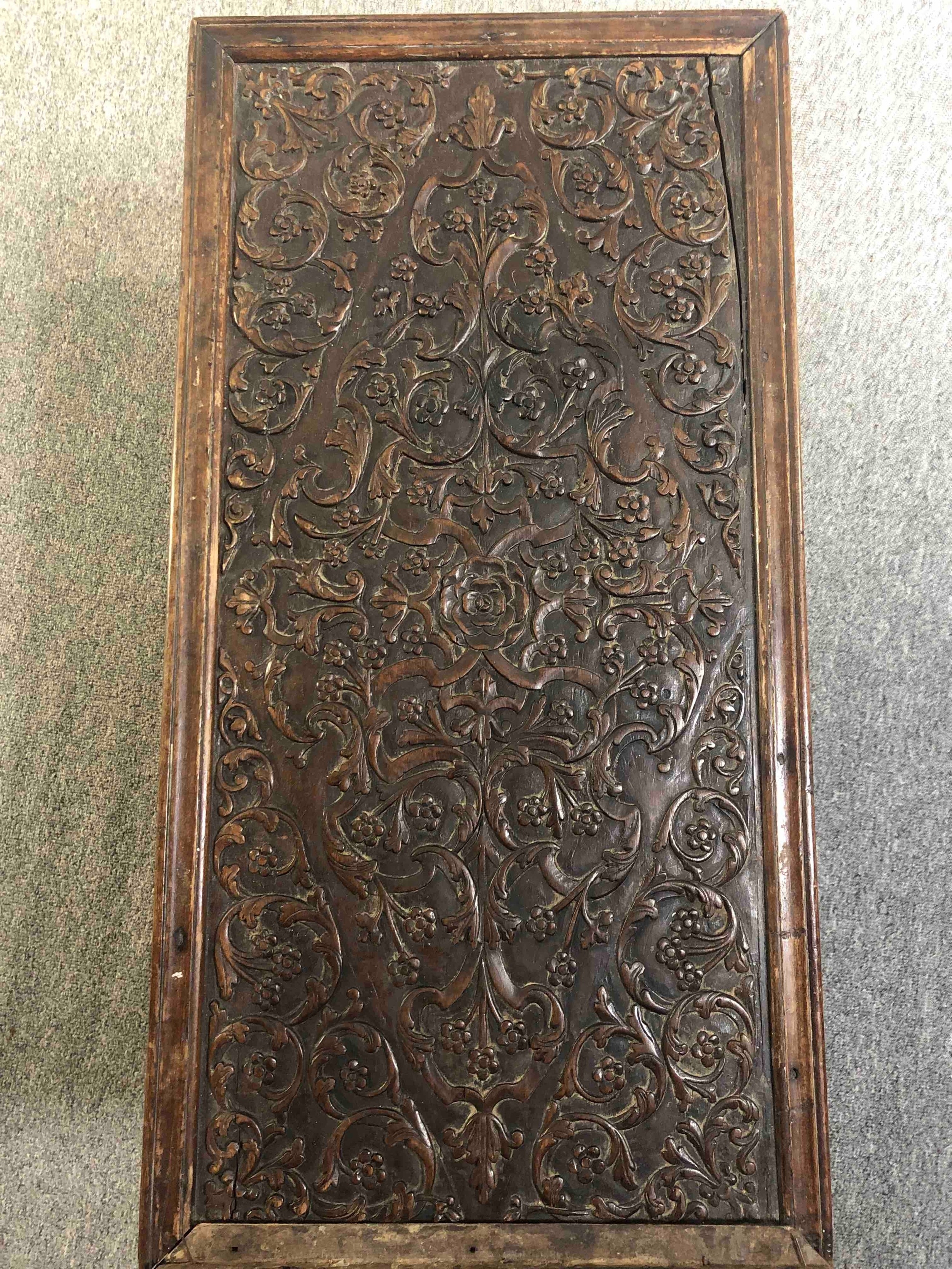 An 18th century oak cupboard base profusely carved allover with scrolling foliate motifs. H.41 W. - Image 5 of 11