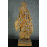 A driftwood abstract sculpture. Honeycombed on a hardwood stand. H.80cm.