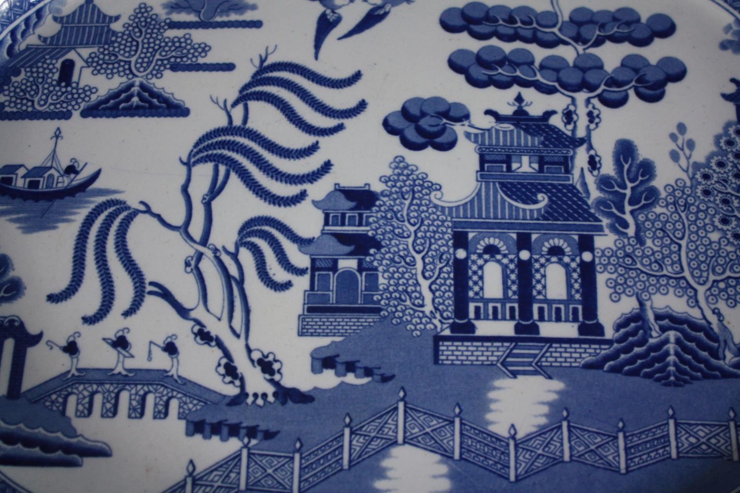 A large blue and white Chinese platter decorated with a pagoda and garden scene. Early to mid - Image 2 of 3