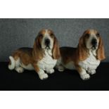 A pair of Basset hounds figures. Moulded and hand painted. H.40 W.55cm. (each)