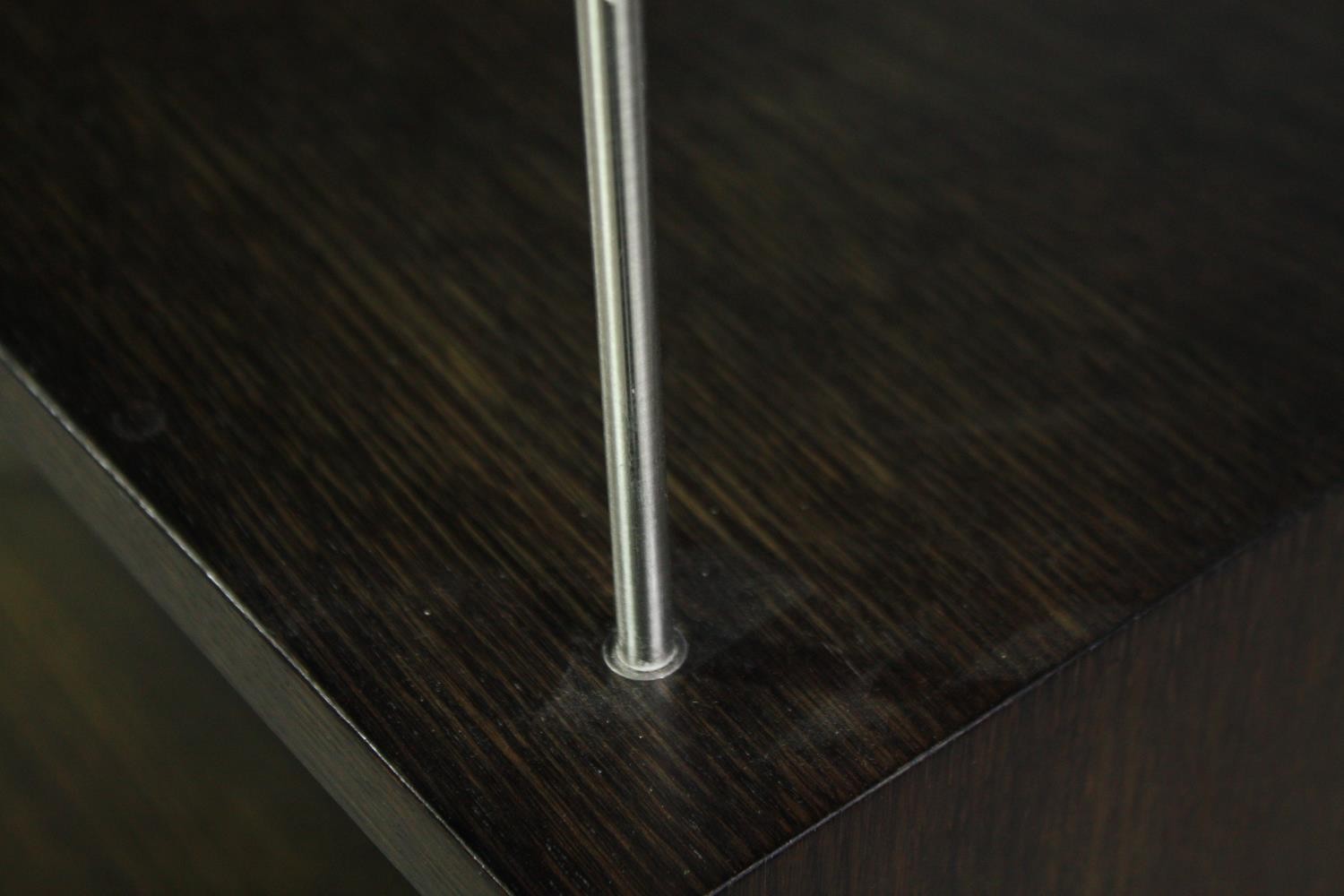 A contemporary teak and chrome display stand. H.133 W.60 D.45cm. (Some veneer lifting but present as - Image 6 of 6