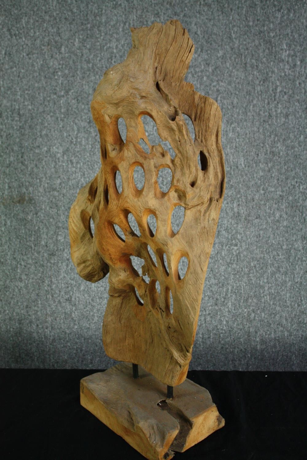 A driftwood abstract sculpture. Honeycombed on a hardwood stand. H.80cm. - Image 2 of 4