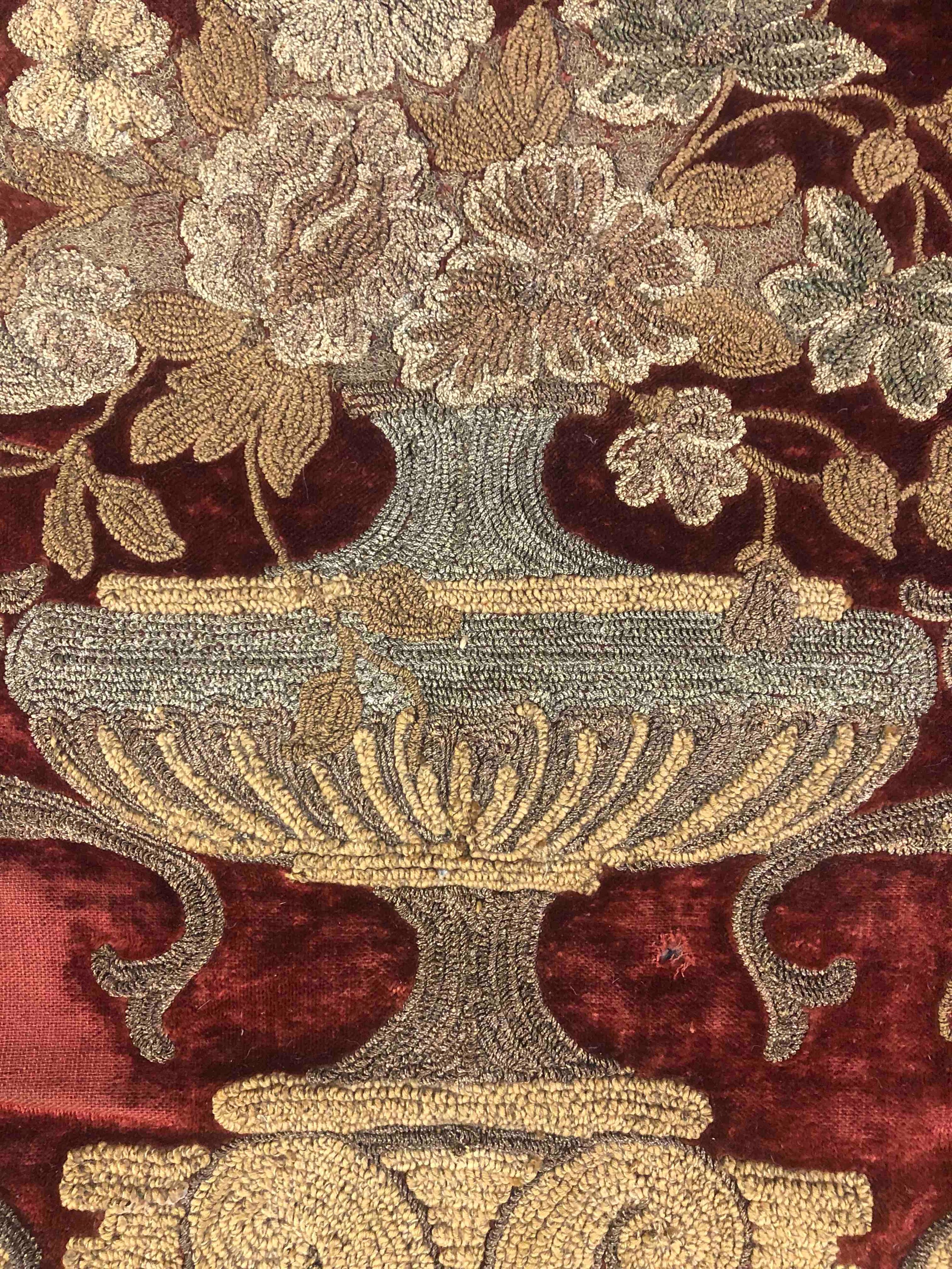 A 19th century red silk velvet pelmet with classical flower urn design, embroidered with gold and - Image 3 of 6