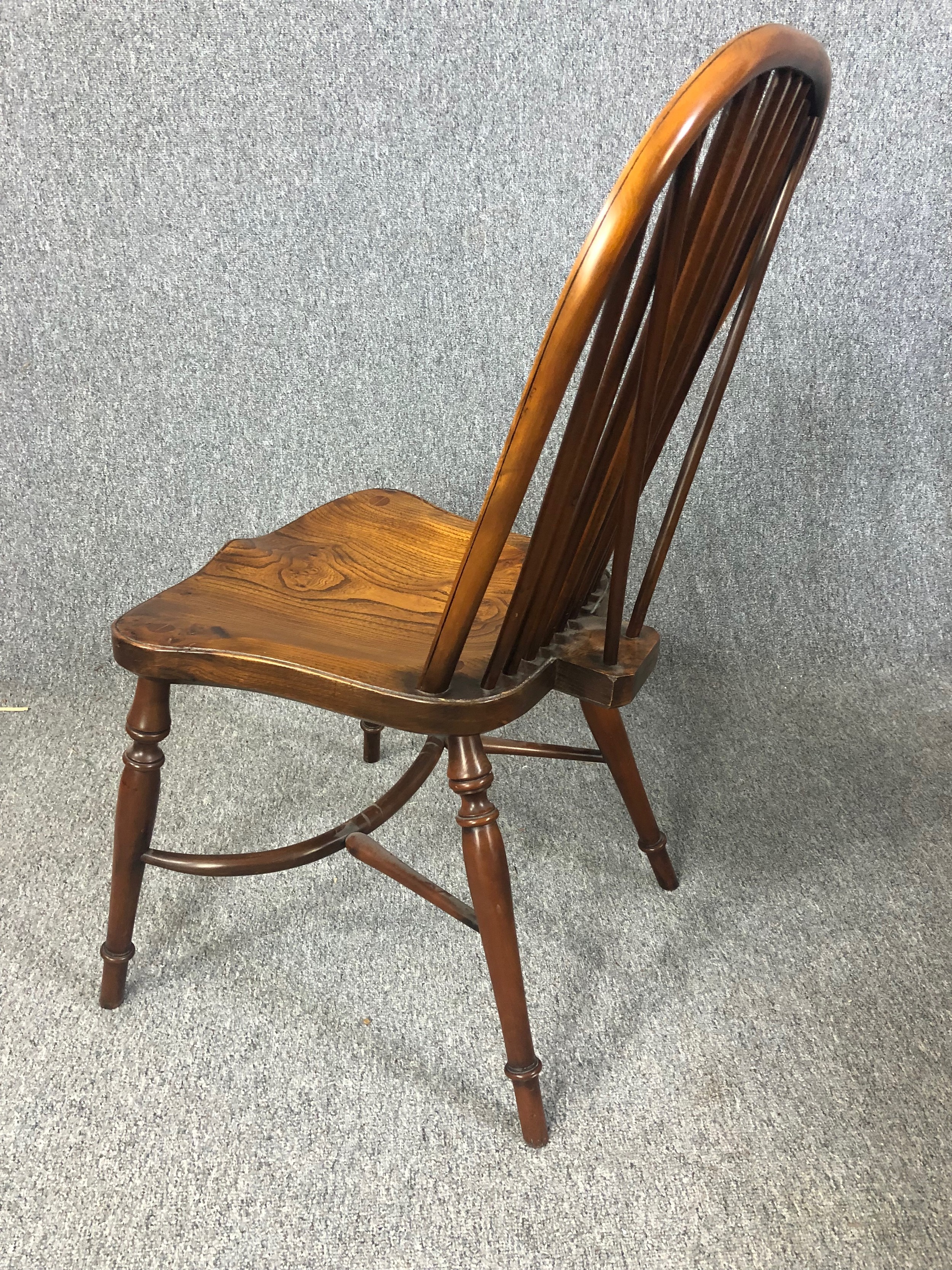 Dining chairs, a set of eight Windsor stick back style in yew with elm saddle seats on crinoline - Image 7 of 12