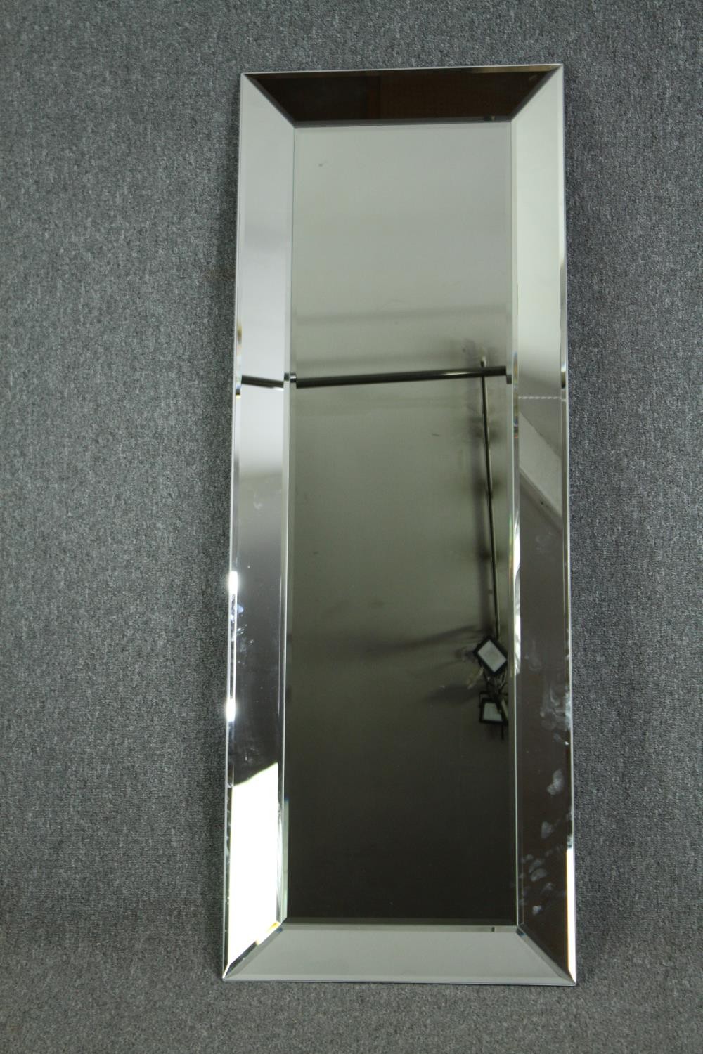 A contemporary full height dressing mirror in mirror glazed frame. H.165 W.60cm.