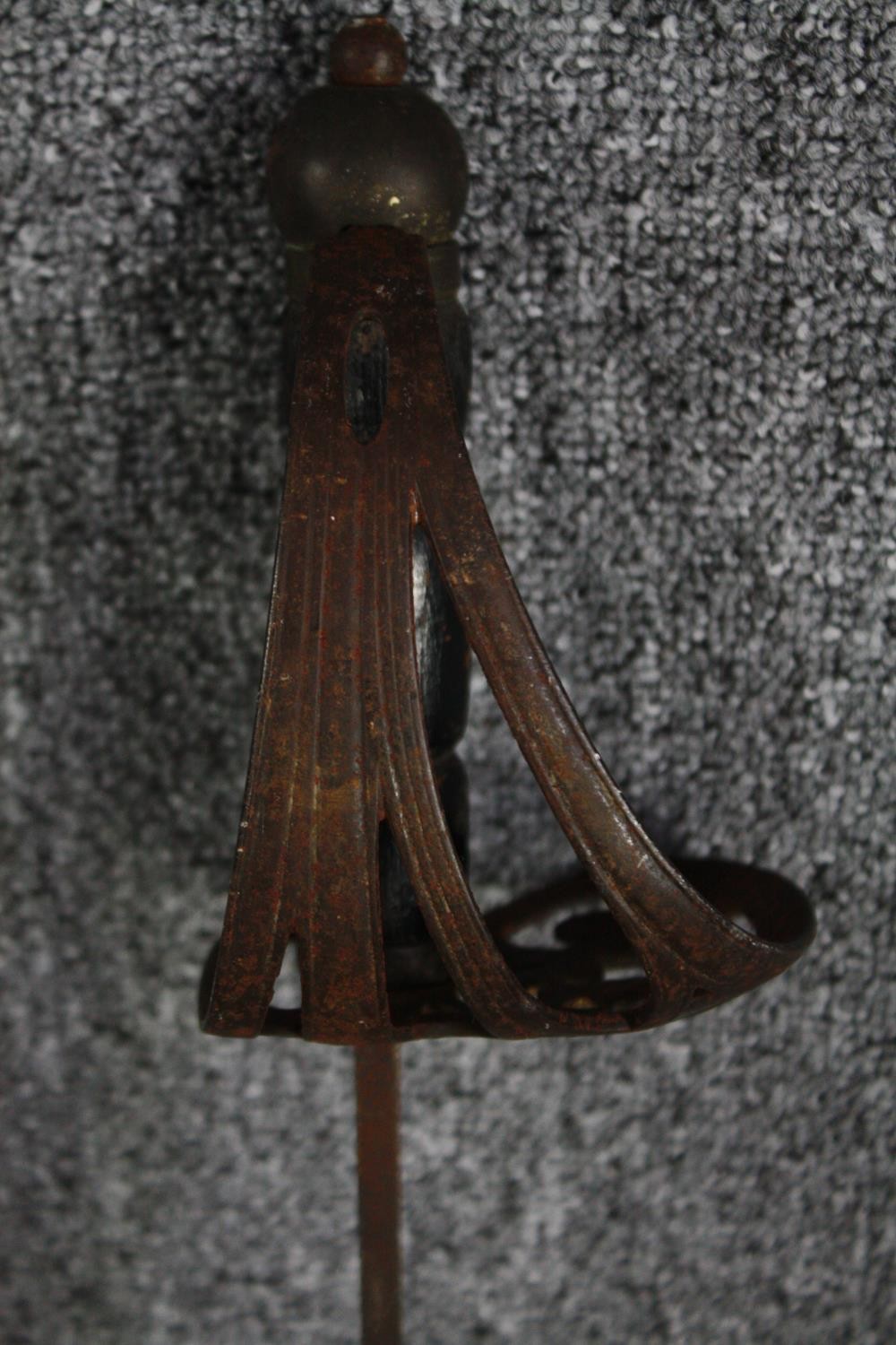 A sword and scabbard. Quite rusted and without a visible maker's mark. With a wooden handle and - Image 7 of 7