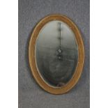 A C.1900 gilt framed mirror with bevelled plate. H.96 W.66cm.