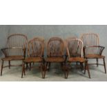 Dining chairs, a set of eight Windsor stick back style in yew with elm saddle seats on crinoline