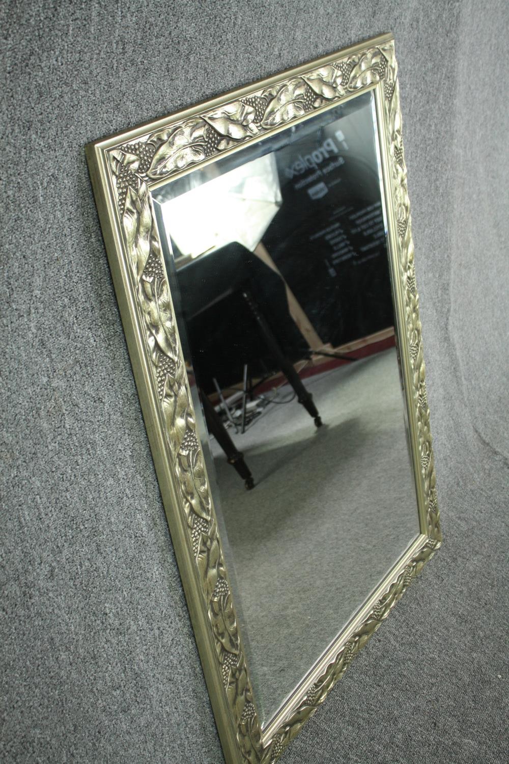 Wall mirror, contemporary silvered foliate frame with bevelled plate. H.107 W.76cm. - Image 2 of 5