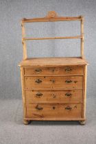 A 19th century pine chest fitted with plate rack. H.162 W.101 D.53cm.