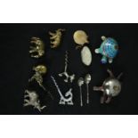 Miscellaneous collection of brass and chrome elephants including vintage bottle openers along with a