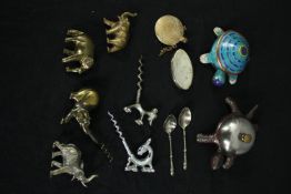 Miscellaneous collection of brass and chrome elephants including vintage bottle openers along with a